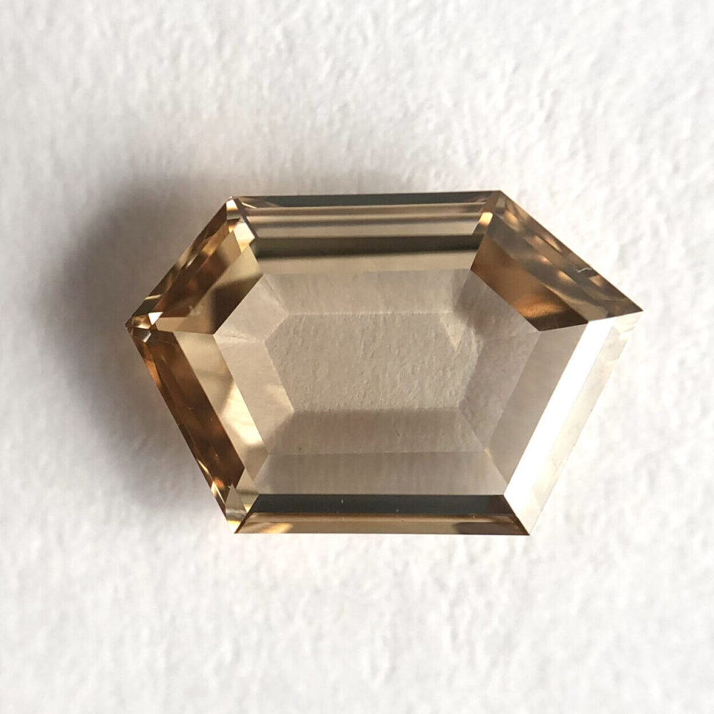 Unspared Hexa shape Dark Brown color portrait cut diamond