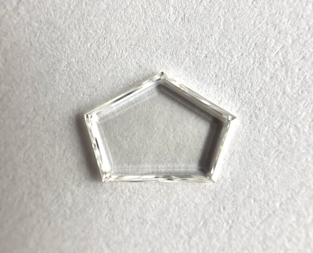 Pentagone shape f color portrait cut diamond