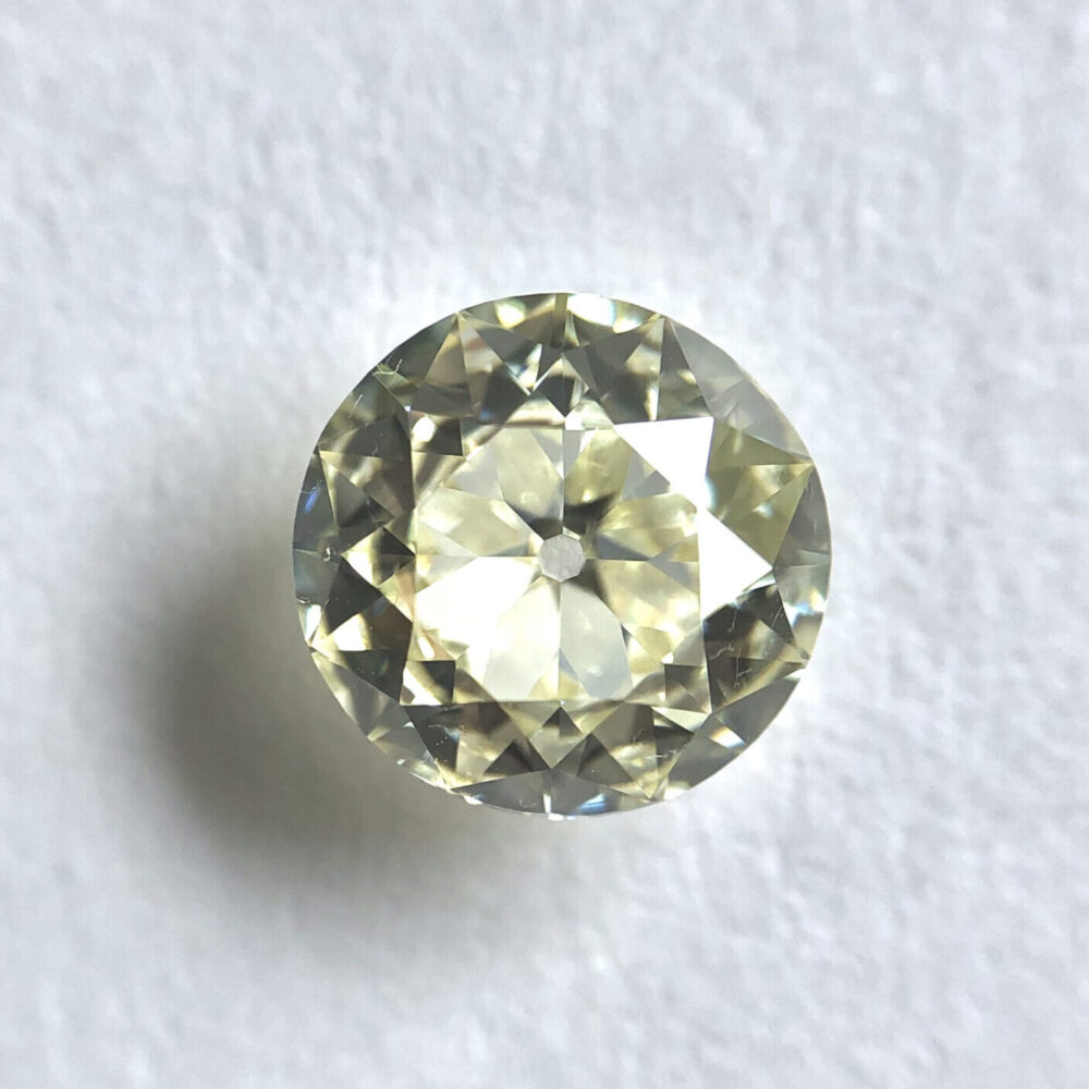 Round shape M color old cut diamond