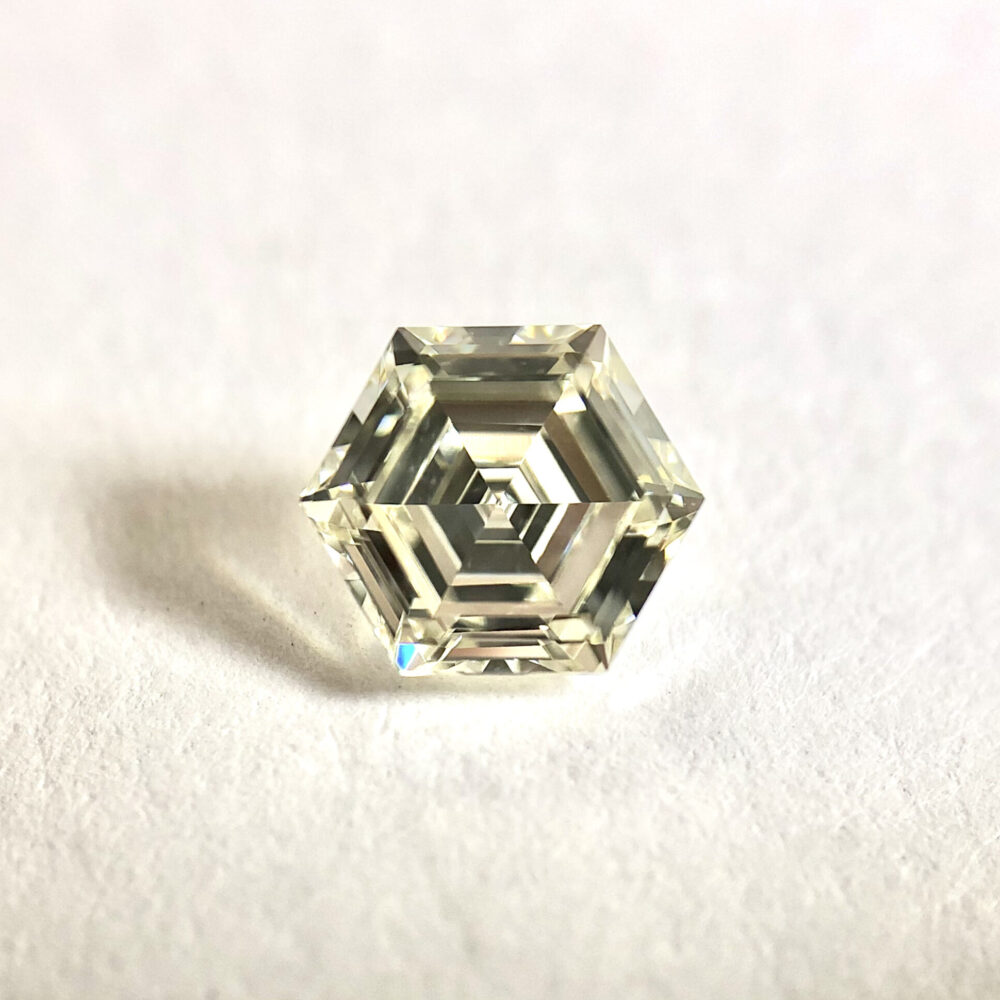 Hexagone shape J color step cut diamond