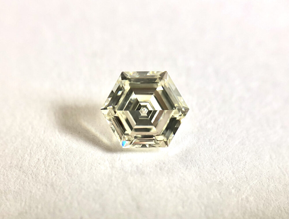 Hexagone shape J color step cut diamond