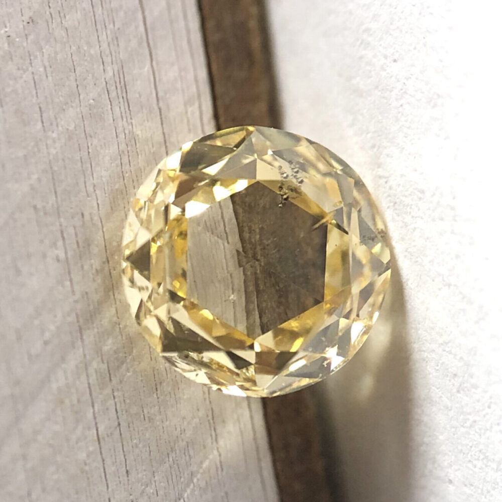 Round shape brownish orange color Rose cut diamond