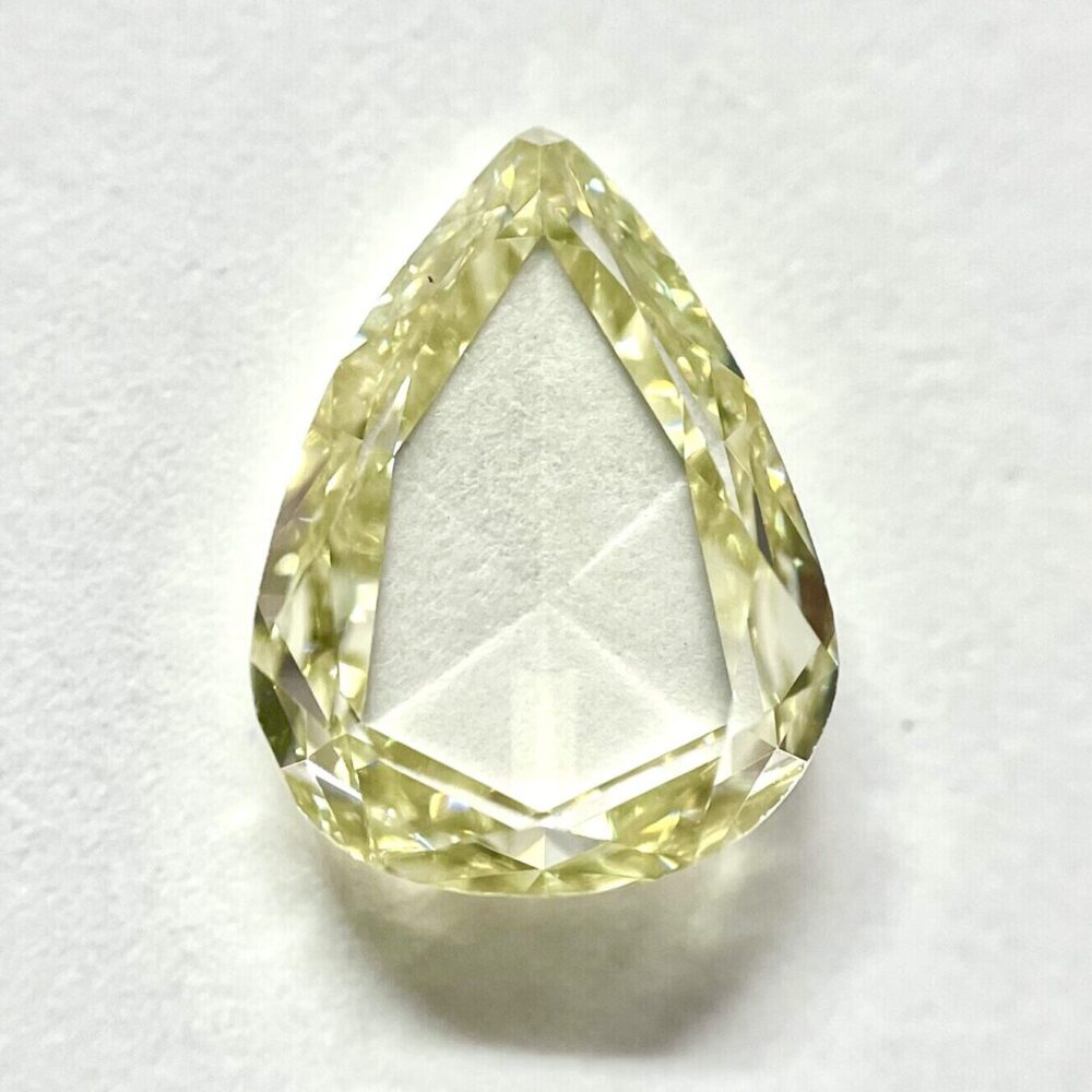 Pear shape Fancy Yellow color Rose cut diamond