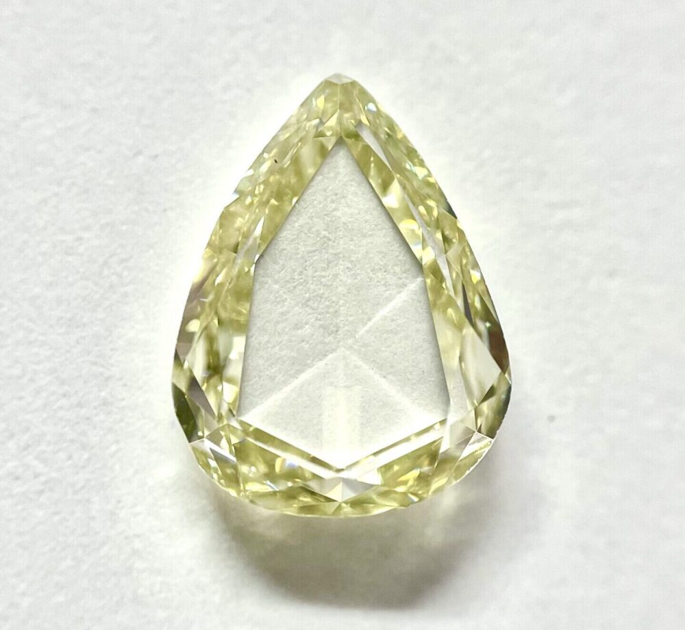 Pear shape Fancy Yellow color Rose cut diamond