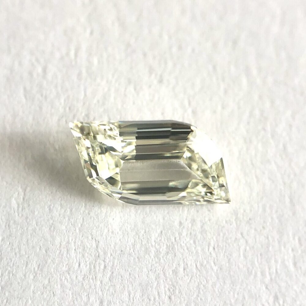 Flame shape K color step cut diamond