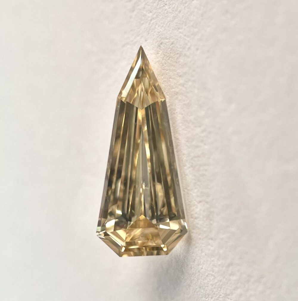 Shield shape LB color step cut diamond