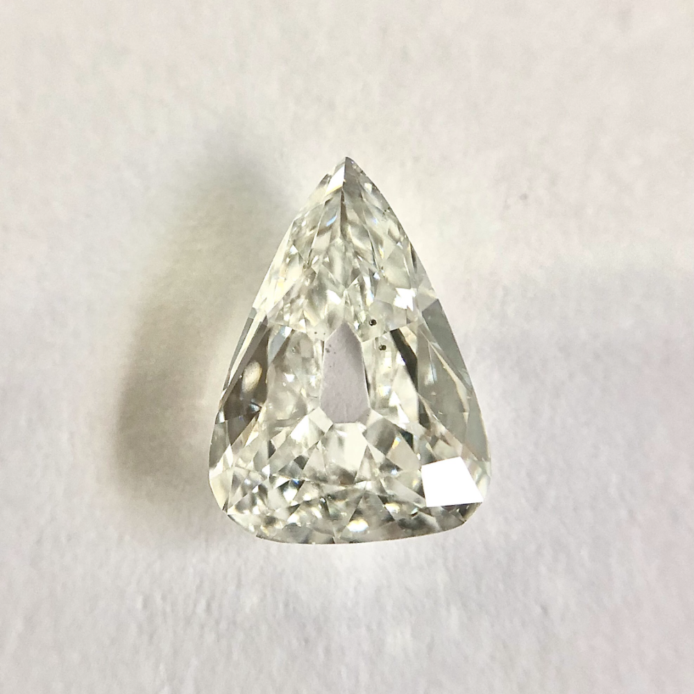 Pear shape G color old mine cut diamond