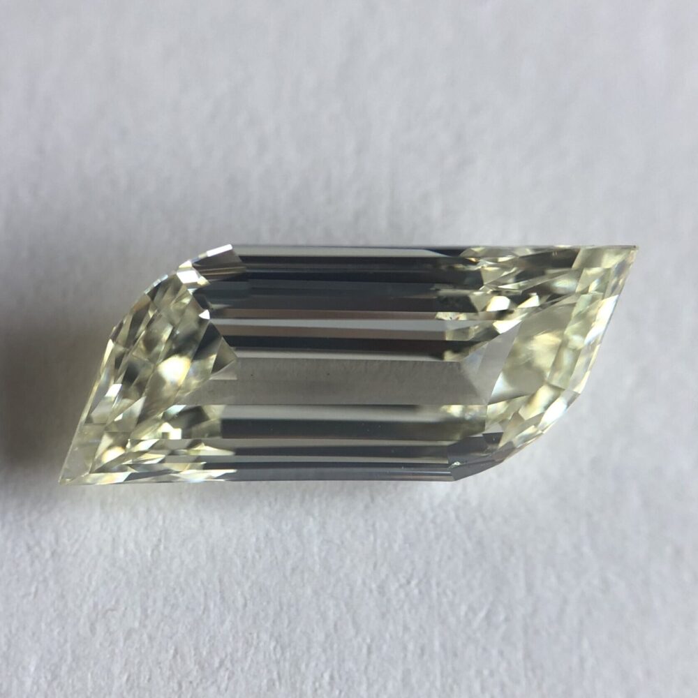 Flame shape K color step cut diamond