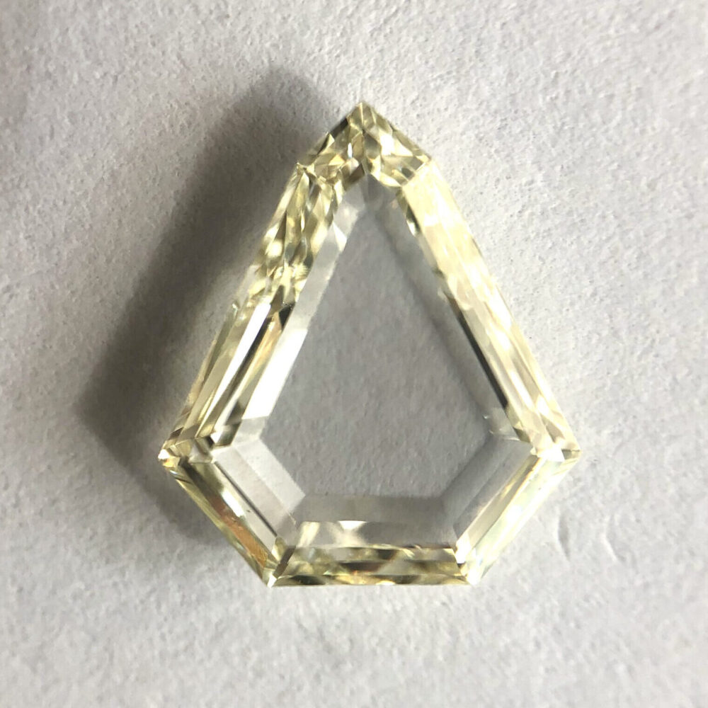 Portrait shape MN color step cut diamond