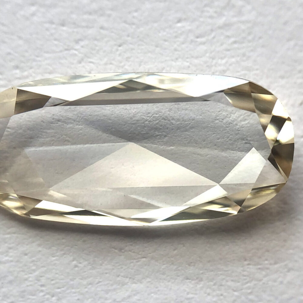 Elongated oval shape LB color rose cut diamond