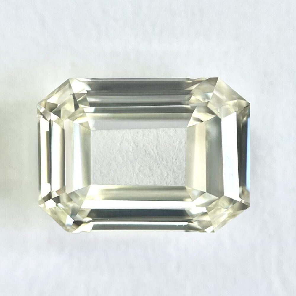 Emerald shape K color portrait cut diamond