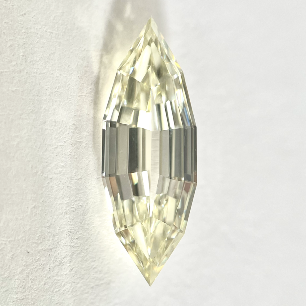 Marquise shape K/L color step cut diamond