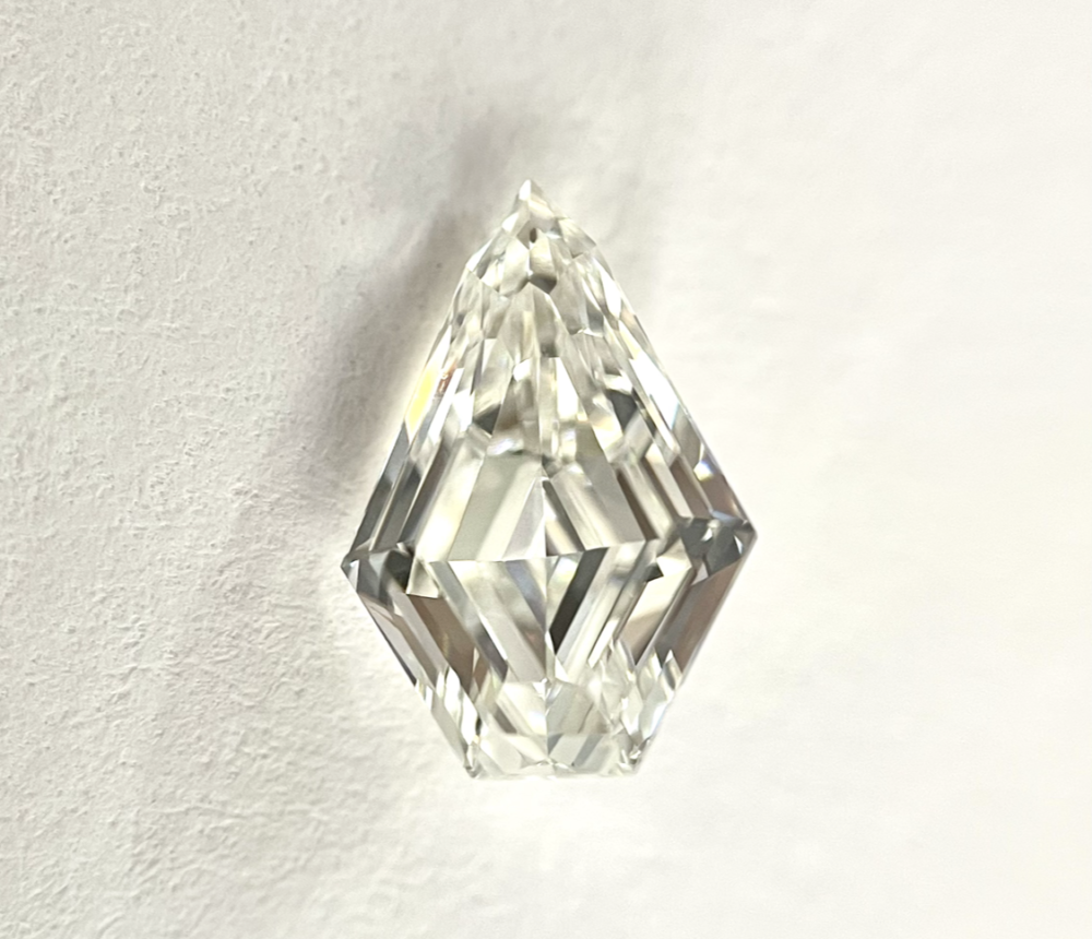 Sheild shape H color step cut diamond