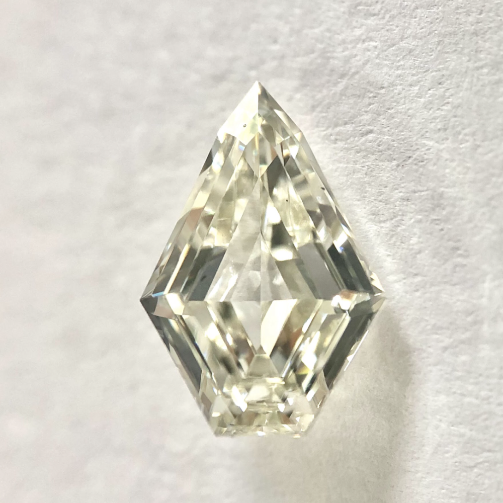 KITE shape J color step cut diamond