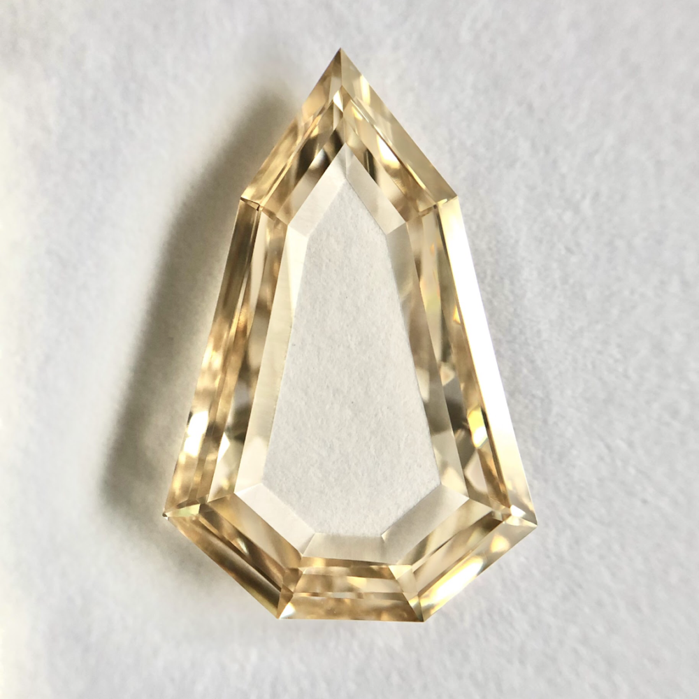 Sheild shape LB color step cut diamond