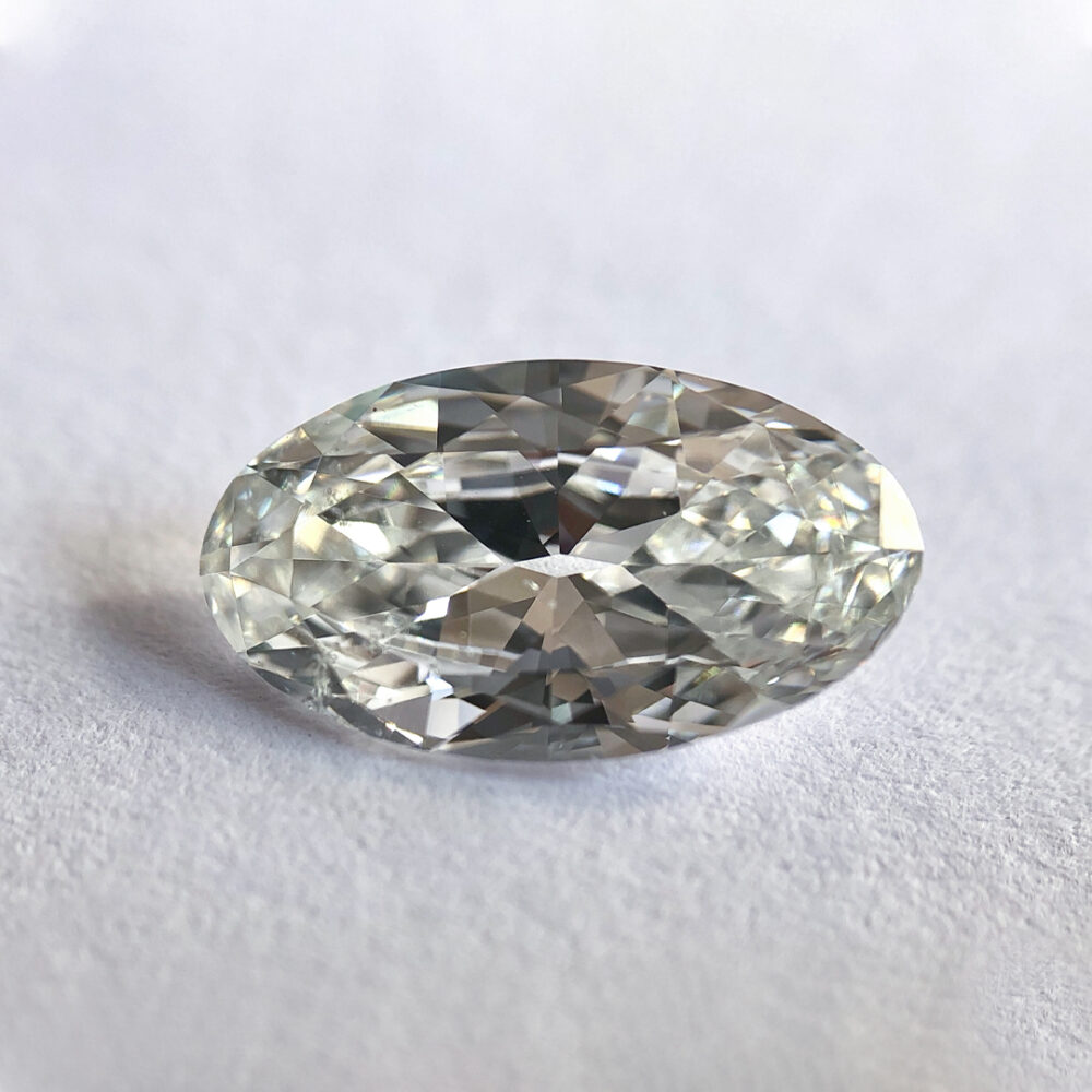 Elongated Oval shape F color old mine cut diamond