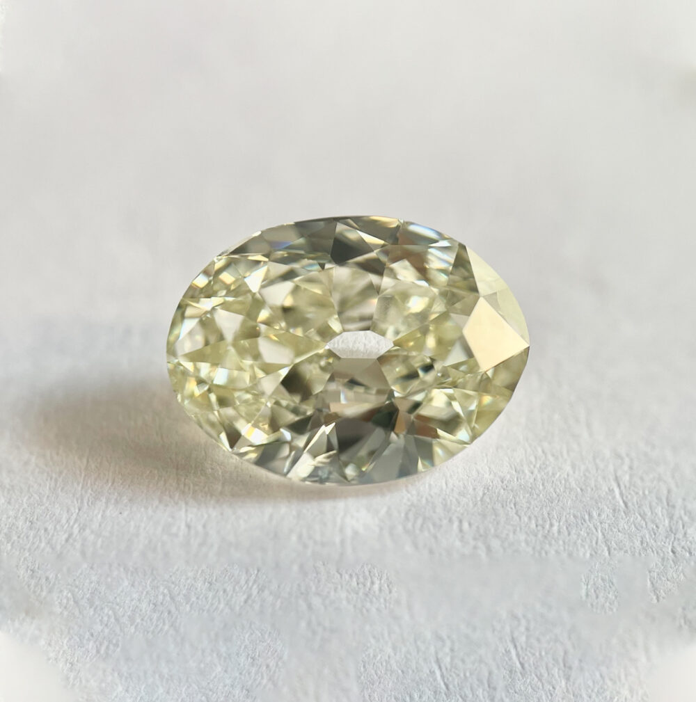 Oval shape L color old mine cut diamond