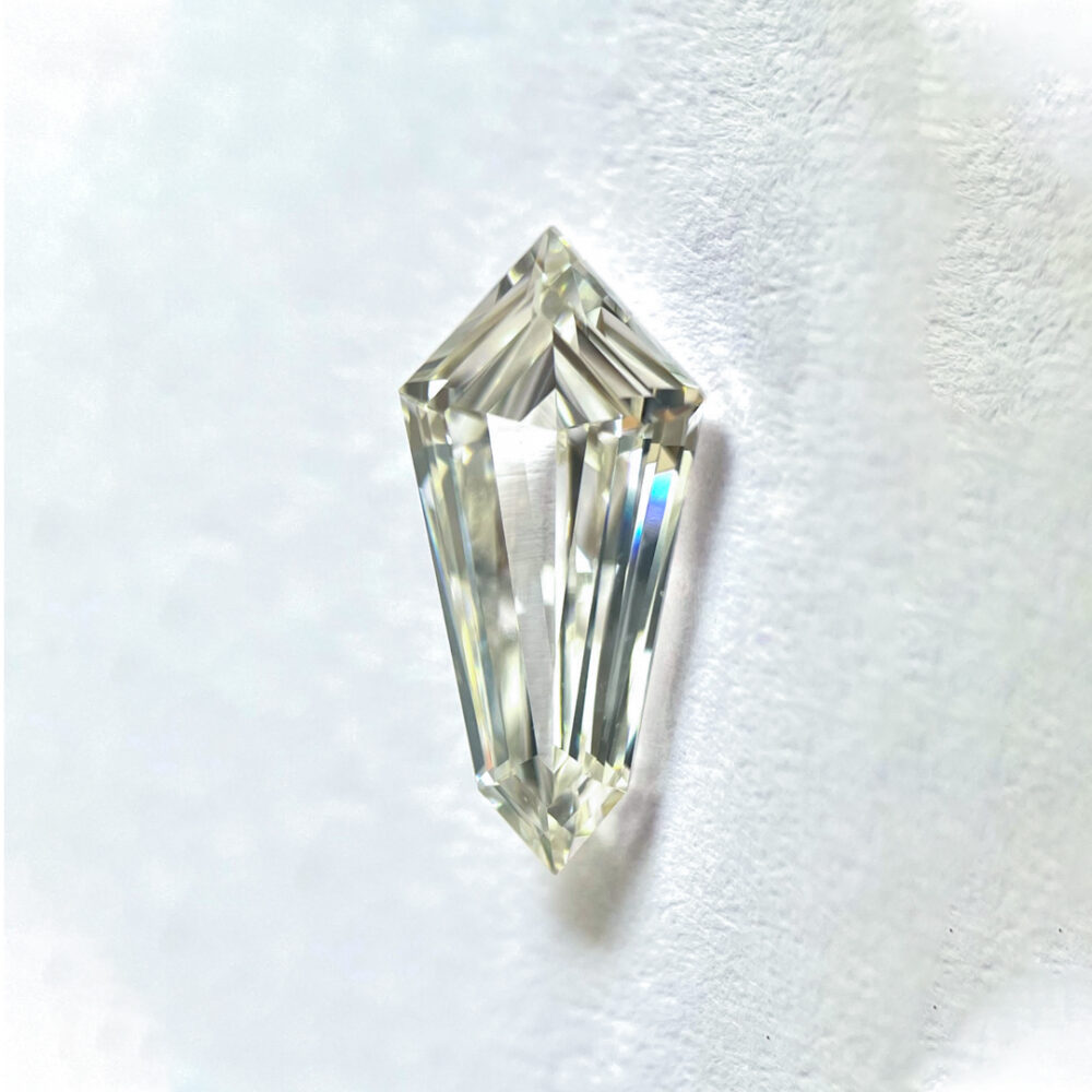 Kite shape I color Step cut  diamond