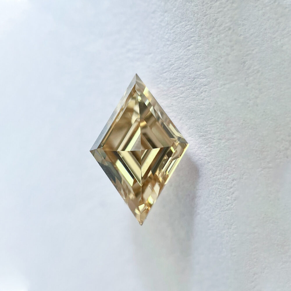 Lozenge Hexagon shape Brown color Step cut  diamond
