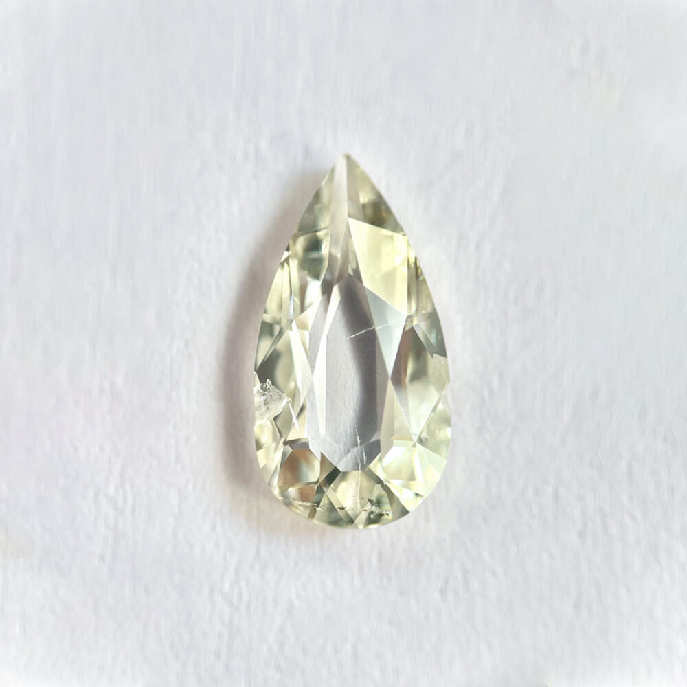 Pear shape K color old mine cut diamond