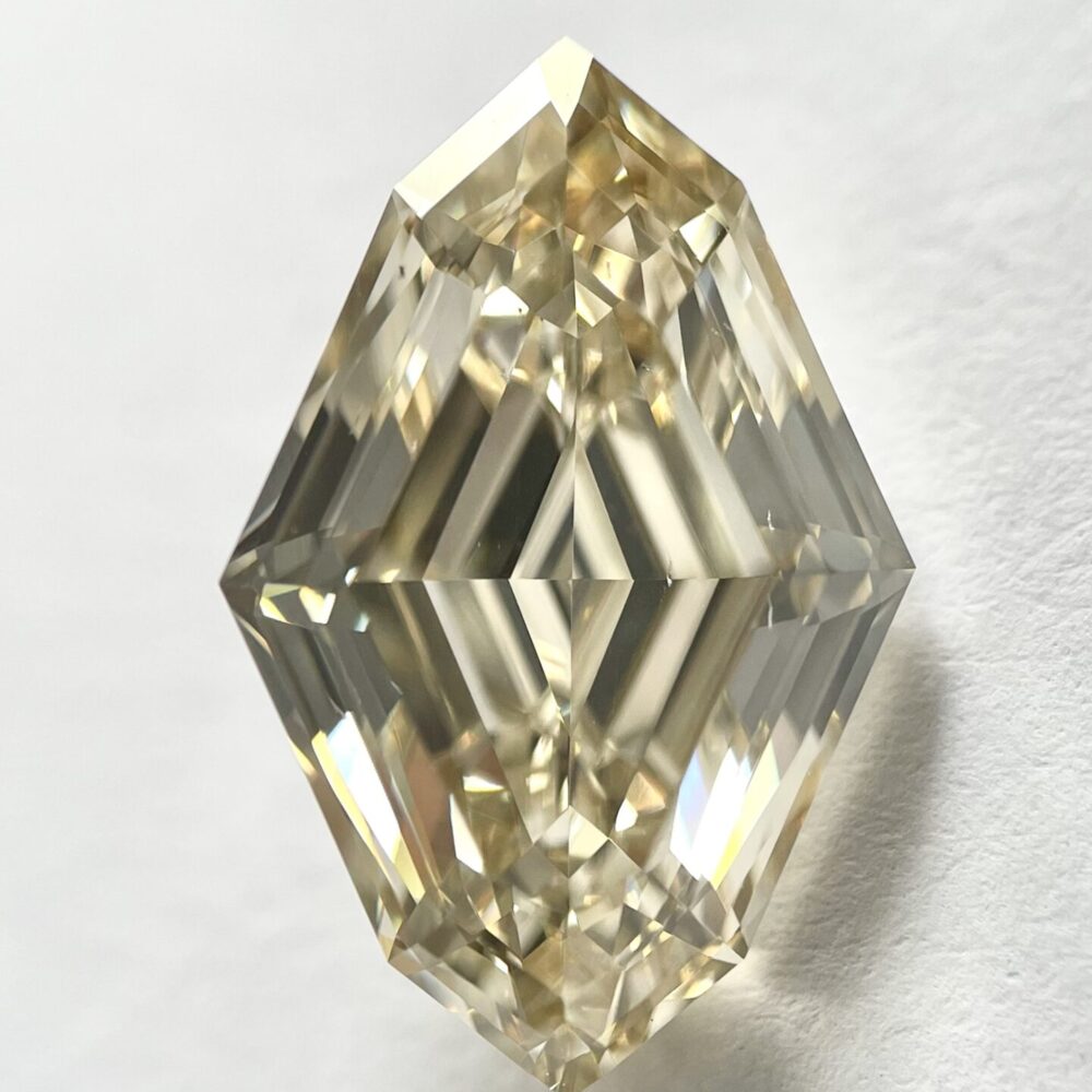 Lozenge shape Brown color Step cut  diamond