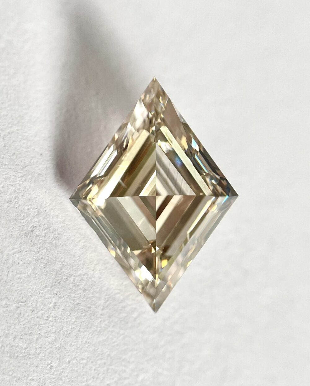 Lozenge shape Brown color Step cut  diamond