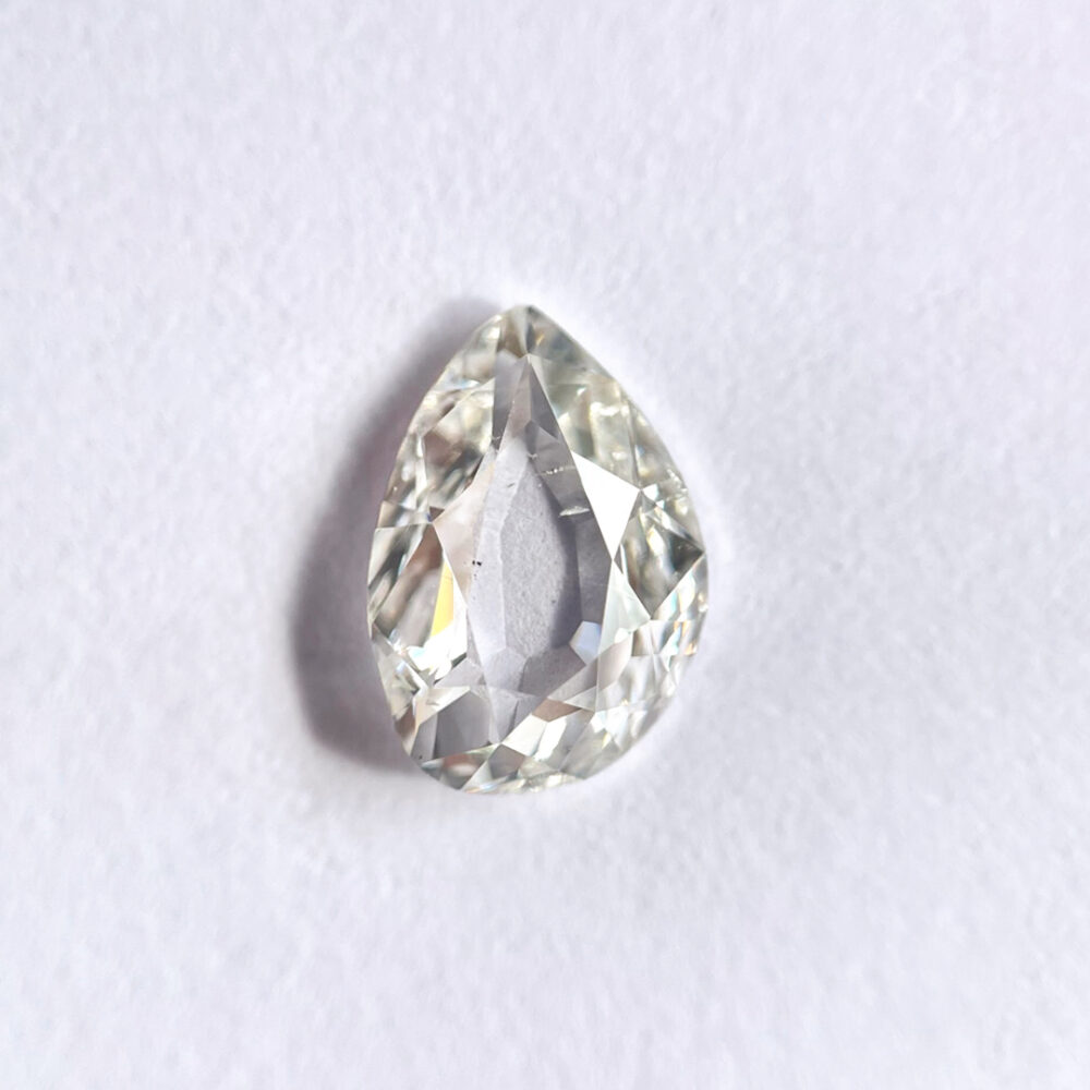 Pear shape H color old mine cut diamond