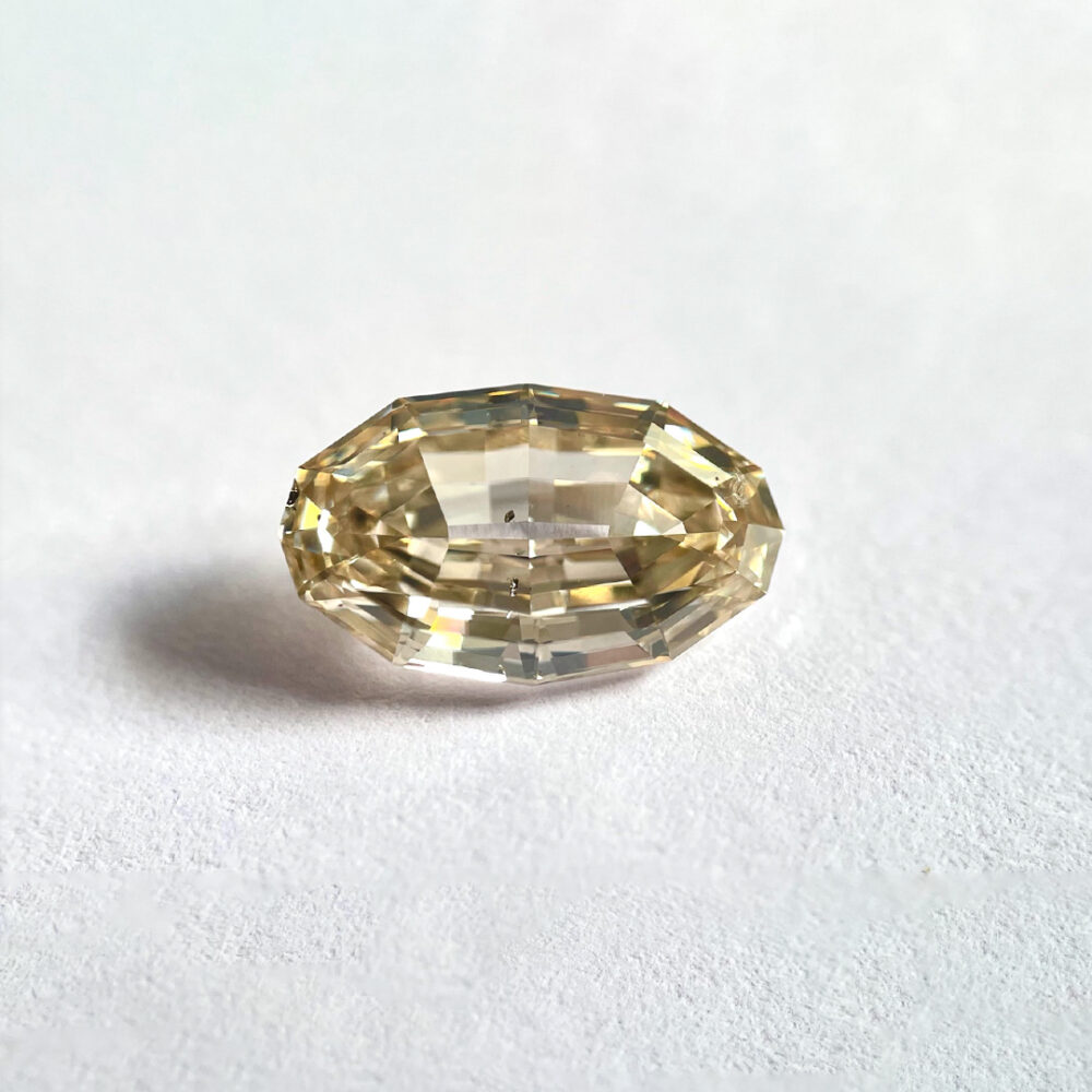 Oval shape Brown colour Step cut diamond