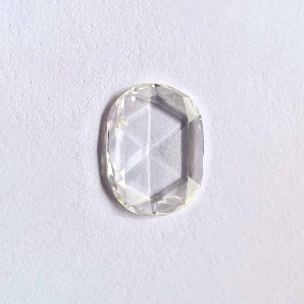 Oval shape H color old miner diamond