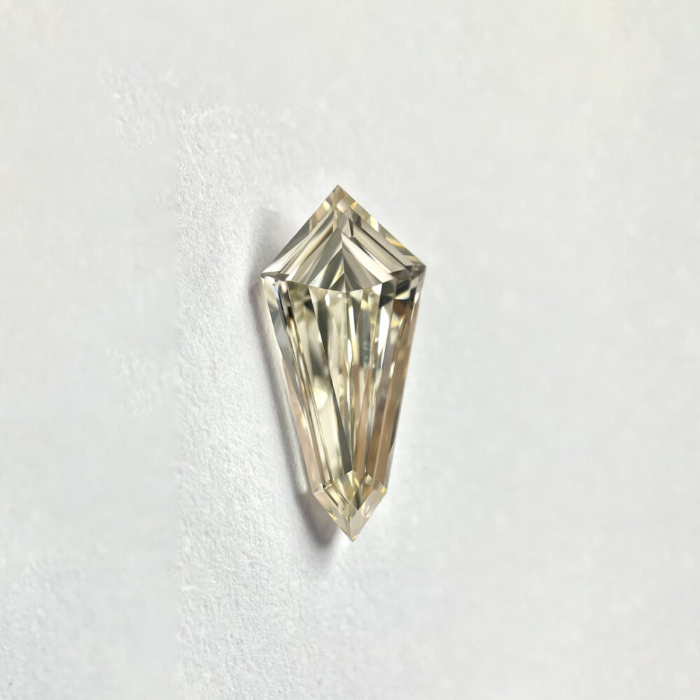 Kite shape Light Brown color Step cut  diamond