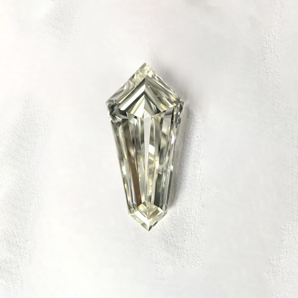 Kite shape J color Step cut  diamond