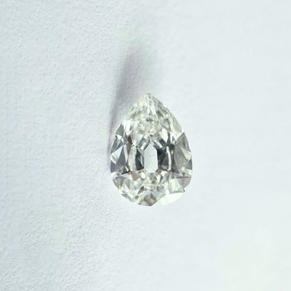 Pear shape J color old mine cut diamond